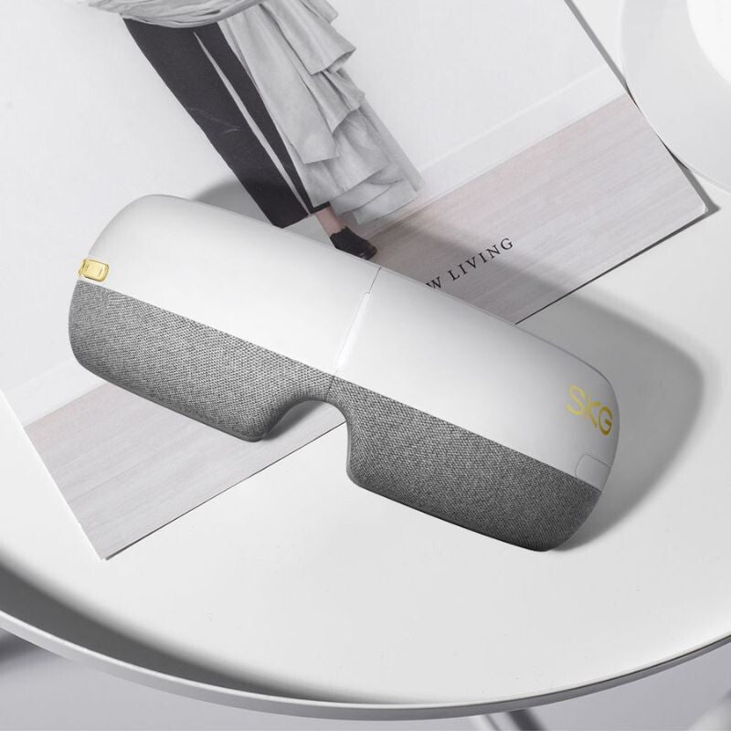 SKG E3 - EN Okos Szemmasszírozó - Relaxáló Hőterápia, Légnyomásos Masszázs és Bluetooth Zene, Fehér - BShopy